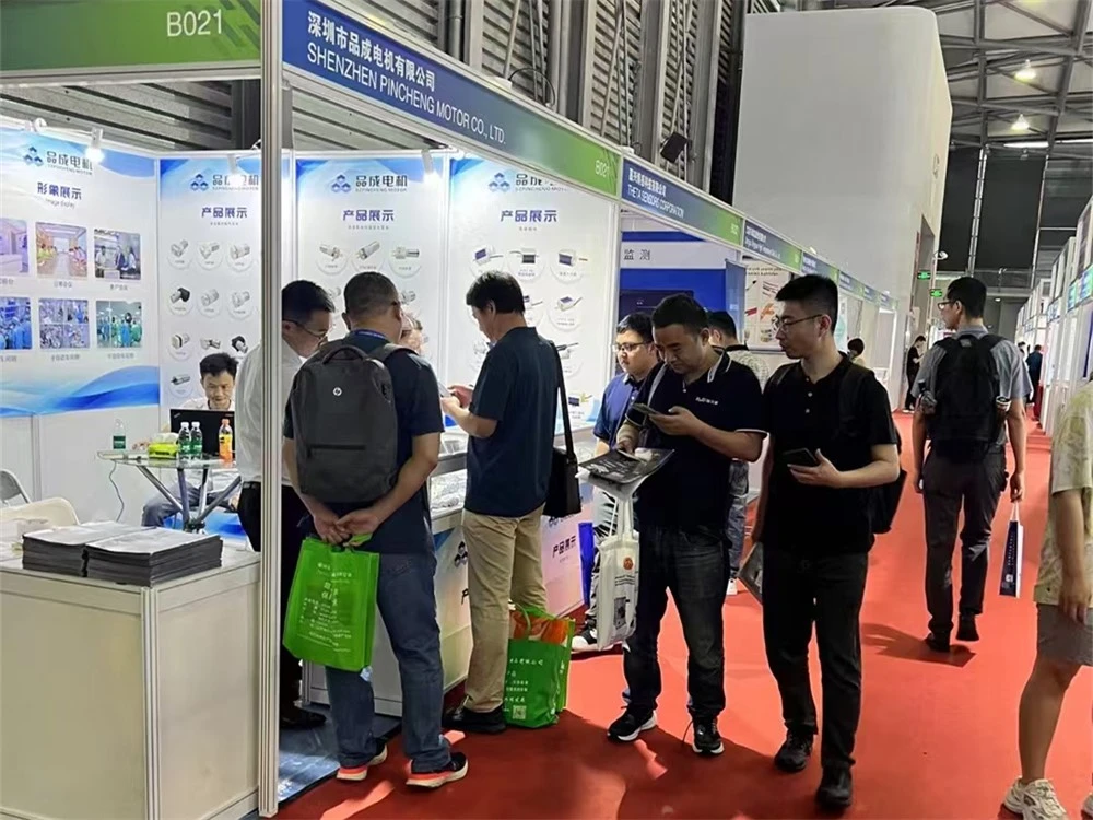 Pinmotor team presenting products at international exhibition Pinmotor team presenting products at international exhibition